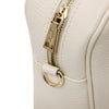 Close up Zip View Of The Beige Backpack Handbag