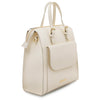 Angled View Of The Beige Backpack Handbag