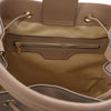 Internal Zip Pocket View Of The Taupe Bucket Handbag