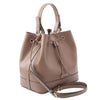 Angled And Shoulder Strap View Of The Taupe Bucket Handbag