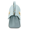 Side View Of The Light Blue Designer Handbag