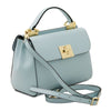 Angled And Shoulder Strap View Of The Light Blue Designer Handbag