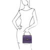 Woman Posing With The Purple Italian Handbag