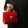 Woman Holding The Red Italian Handbag