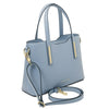 Angled and Shoulder Strap View Of The Light Blue Ladies Small Leather Handbag