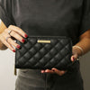 Woman Holding The Black Ladies Zipper Wallet