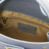 Internal Zip Pocket View Of The Light Blue Leather Tote