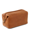 Angled View Of The Honey Leather Wash Bag