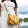 Woman Posing With The Mustard Leather Over Shoulder Bag