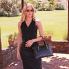 Women Posing With The Black Ladies Small Leather Handbag