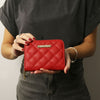 Woman Holding The Lipstick Red Small Zip Around Wallet