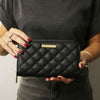 Woman Holding The Black Soft Leather Wallet