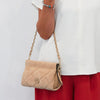 Woman Posing With The Beige Suede Shoulder Bag