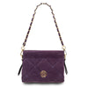 Front View Of The Purple Suede Shoulder Bag