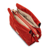 Overhead Compartment View Of The Red Suede Shoulder Bag