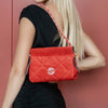 Woman Posing With The Red Suede Shoulder Bag