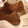 Internal Pocket View Of The Champagne Leather Bucket Bag