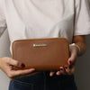 Woman Holding The Cognac Zipper Wallet For Women